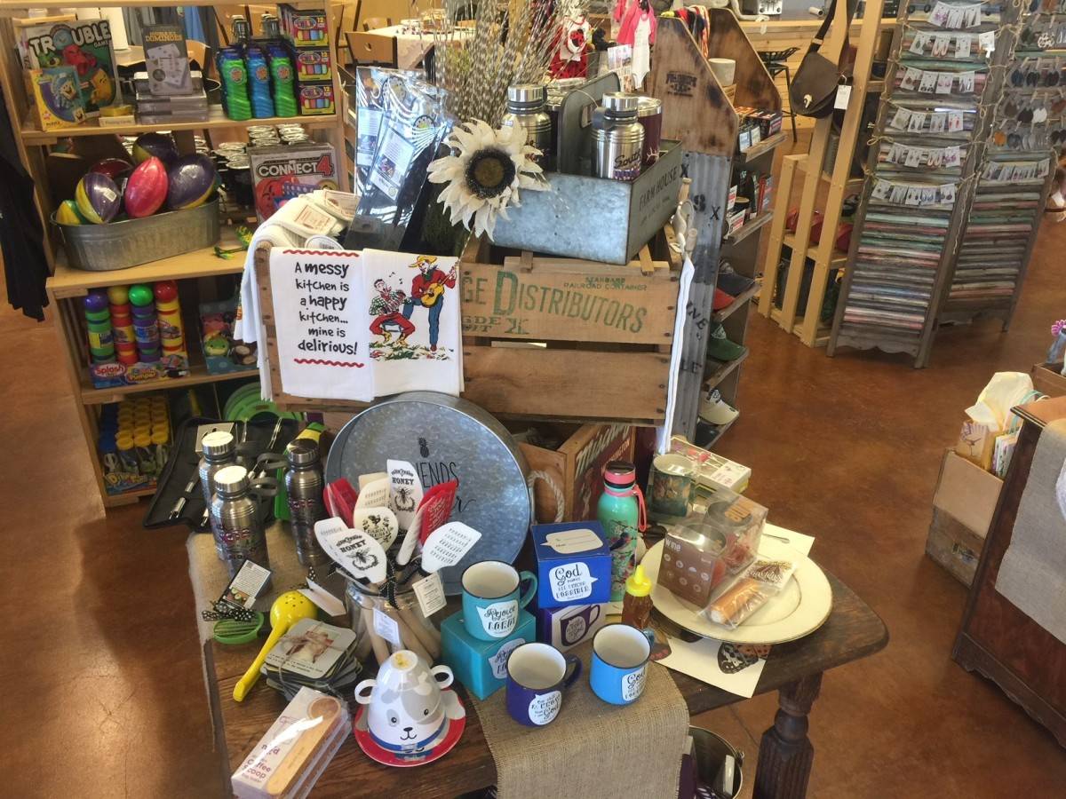 Mugs, kitchen items, games and other merchandise at our General Store